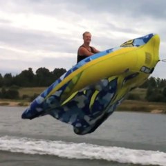 A raft flying over a lake