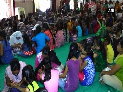Communal harmony Muslim girls apply henna on Hindu girls hands on Gauri Vrat