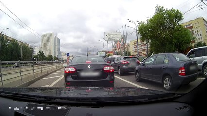 Pedestrian hit by scooter after trying to cross a risky road