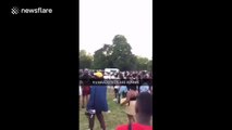 People throwing bottles at police vans after Hyde Park water fight