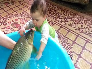 9 Months Noughty Boy Kissing To Fish