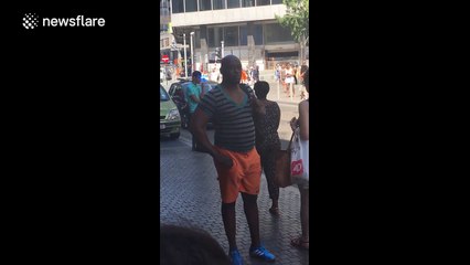 Police hold man at gunpoint after possible bomb alert in Brussels