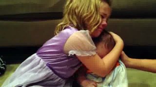 Girl crying because baby is too cute Video -