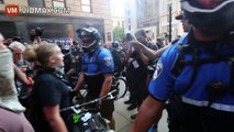 Anarchist learn quickly that trying to shove your way through bike cops doesn't work
