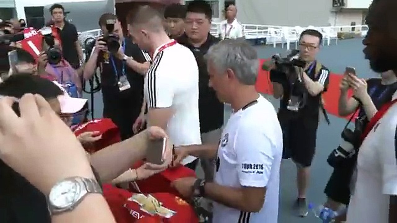 OUCH! Jose Mourinho refuses to sign a Chelsea shirt in China