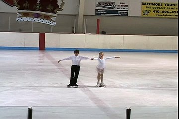 Maya (10) and Ryan (10) pair skating at a Holiday show