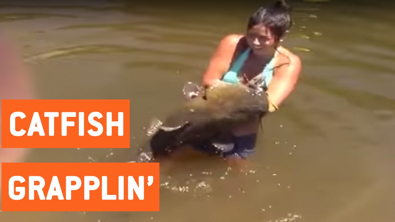 Girl Catches HUGE Catfish With Bare Hands