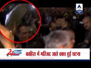 Iran president appears to have shoe thrown at him during his Egypt visit