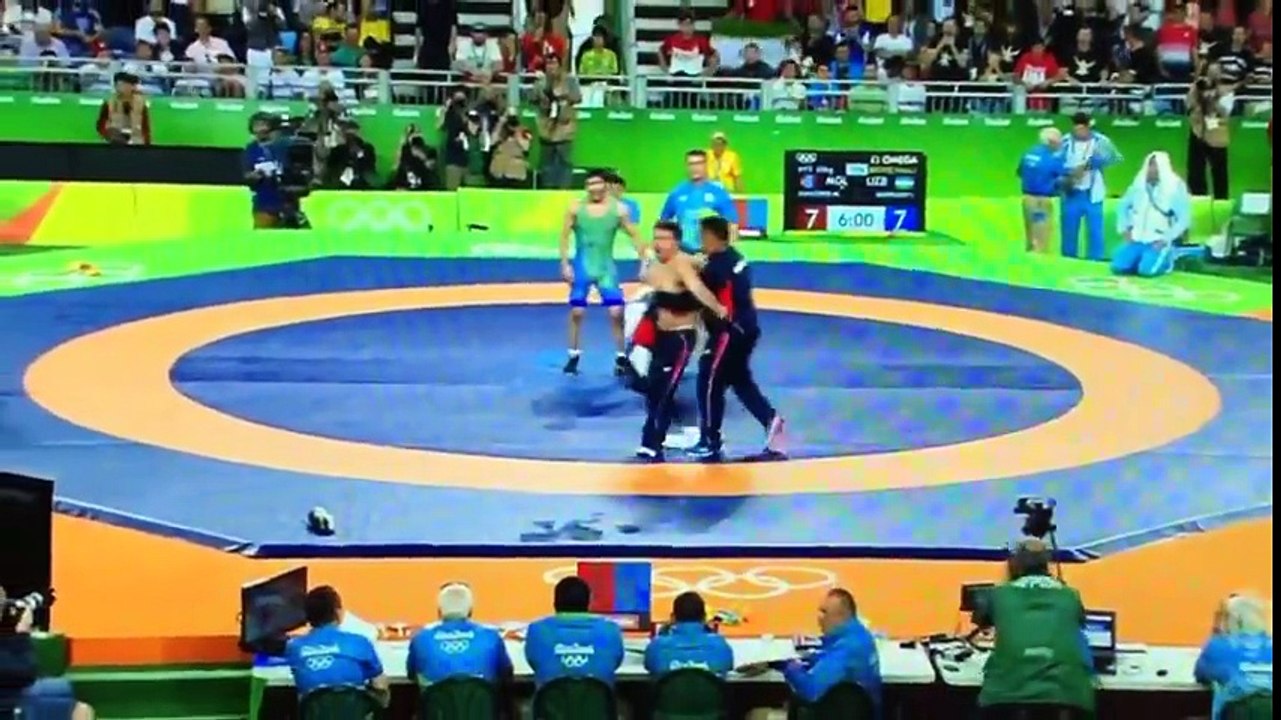 Mongolian wrestling coaches go nuts, strip down after unfavorable decision