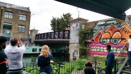 West Ham fans jump off bridge into canal after beating Bournemouth