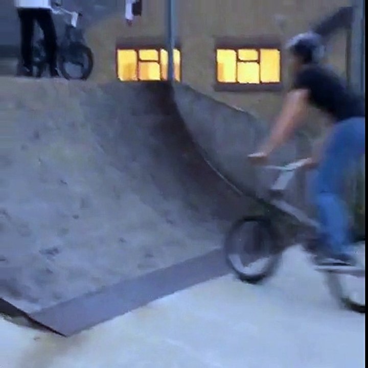 Friends Helping Out With A Bicycle Trick