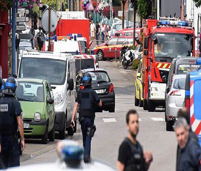 Knifemen shot by police after killing priest in Normandy church
