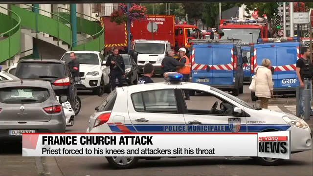 ISIS militants kill priest, take hostages in attack on French church