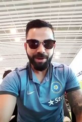 Virat Kohli with Umpire Aleem dar wishing his son Hassan all the best for future