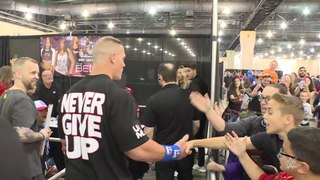 John Cena searches out Nikki Bella for a kiss at Wizard World Philadelphia- June 7, 2016