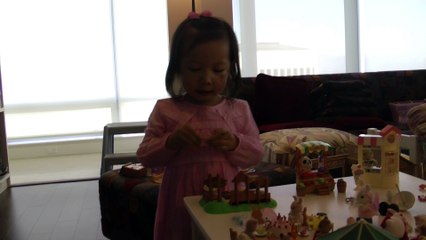 Girl Playing Sylvanian Families Sandbox