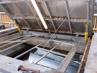 Ouverture et fermeture trappe silo bois - www.chaudronnerie-cicf.com