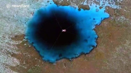Aerial footage of world's deepest underwater sinkhole