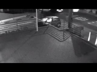 Car explodes outside police station