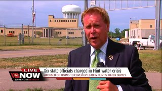 Six state officials charged in Flint water crisis
