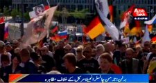 Berlin: Protest against German chancellor angela merkel