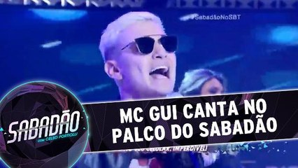 Mc Gui canta no palco do Sabadão