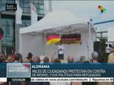 Alemanes protestan en Berlín contra políticas para refugiados