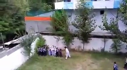 Watch how this teach is brutally beating the kinds of his school - rare video