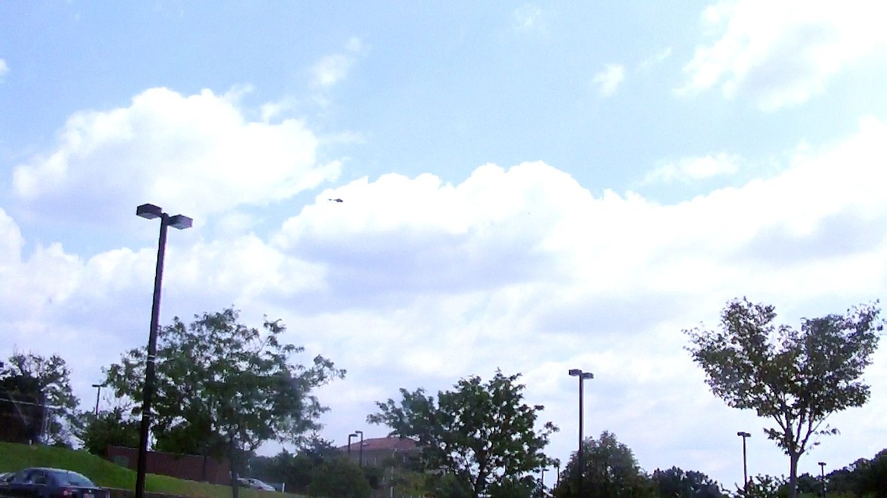 Helicopter flying over location