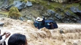 Mini Bus Gets Stuck Crossing The River