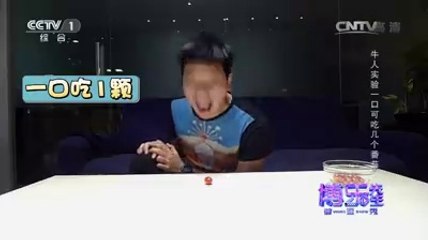 Let's see how many tomatoes he can swallow at one bite to make a record