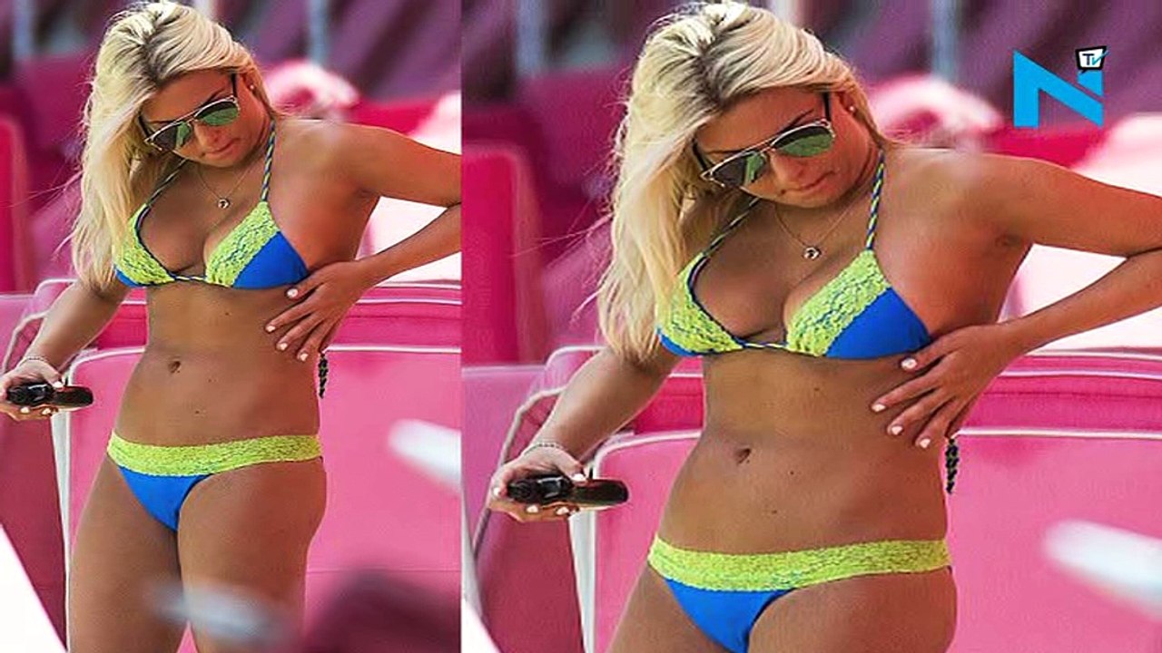 Zara Holland struggles to fit into bikini