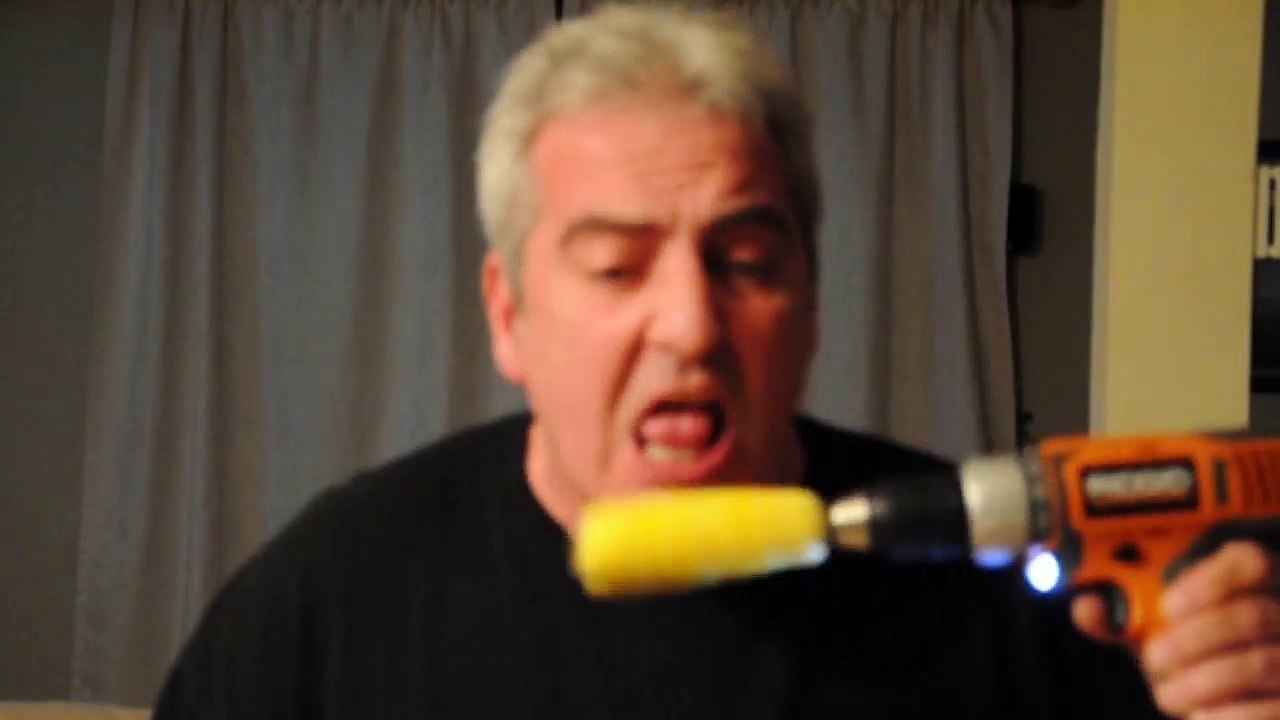 Man Eats Corn on the Cob from a Drill