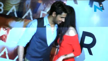 Katrina’s red cocktail dress is a dress to kill
