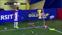 Mexico fans throwing bottles at player taking corner. Mexico vs trinidad football