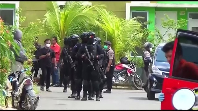 Indonesian police raid houses of Singapore attack suspects