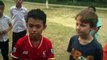 Bowen interviews boy in Vientiane, Laos SOS Village