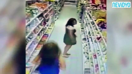Genç kadının iğrenç hırsızlığı güvenlik kamerasında