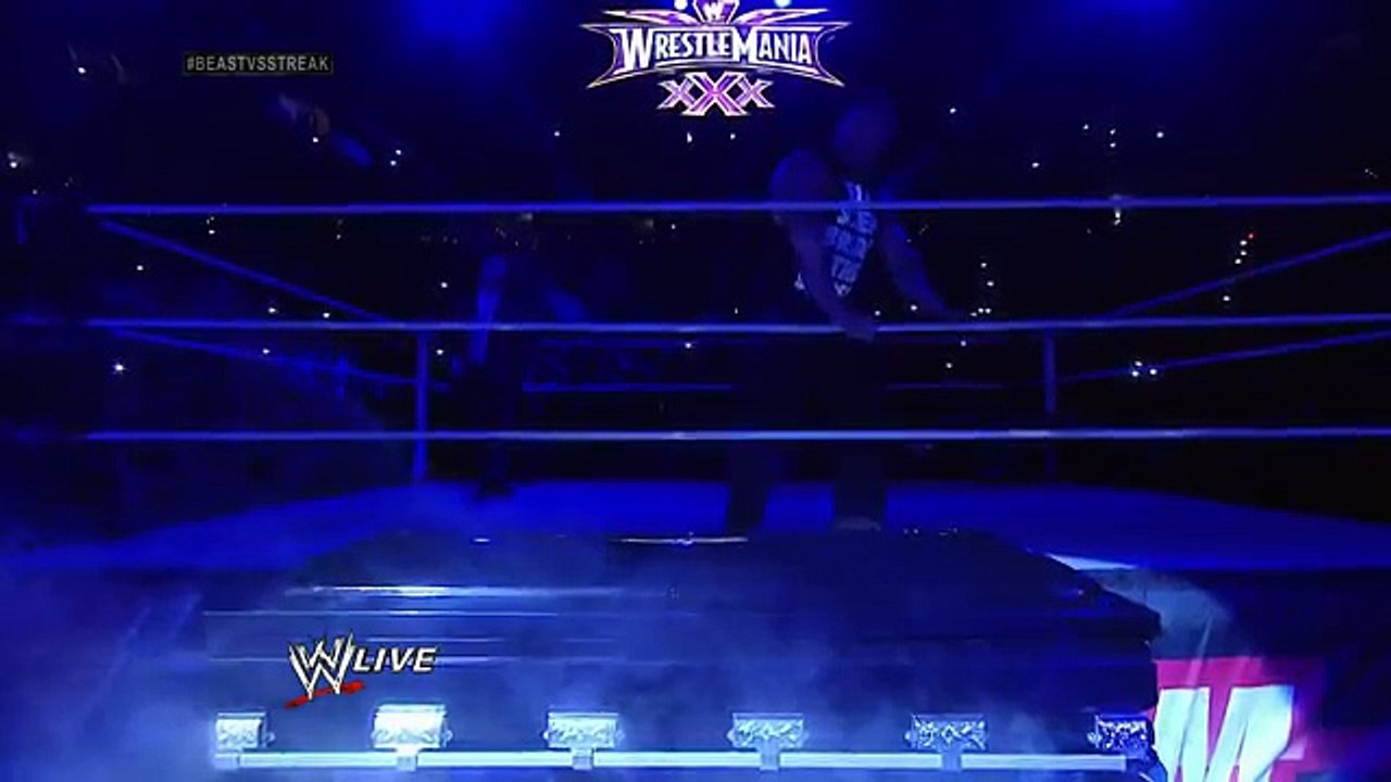 Undertaker rises from a coffin to attack Brock Lesnar- Raw, March 24, 2014[by ShareTV]