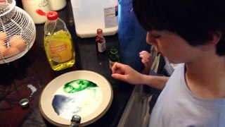 Food colouring and washing up liquid experiment