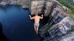 Daredevils Show the Camera How to Dive From Cliffs Into Water