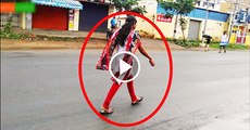 Real-Ghost-Caught-On-Camera--Entering-In-To-Women--In-Public-Road--GhostWorldMedia