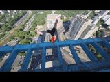 Brave Daredevil Performs Crazy Leaps on Rooftops