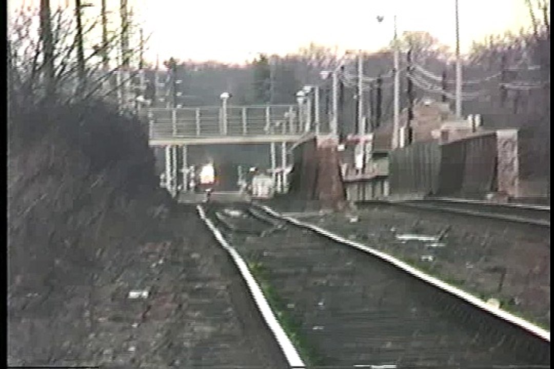 Two LIRR MP-15's sandwich an old coach Smithtown NY 1994