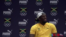 Usain Bolt sambas off the stage after journalist serenades him