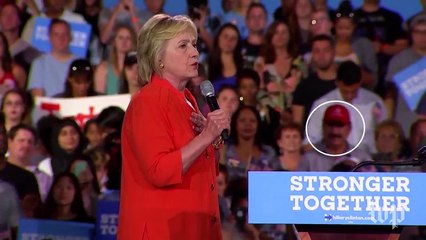 Watch Orlando shooter's father listen to Clinton at rally