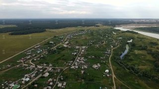 Russia, Novosibirsk, June 2015: Aerial video of countryside and river