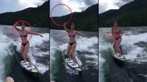 Cette fille fait du hula hoop sur un surf