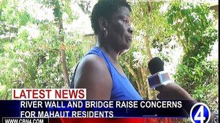 RIVER WALL AND BRIDGE RAISE CONCERNS FOR MAHAUT RESIDENTS