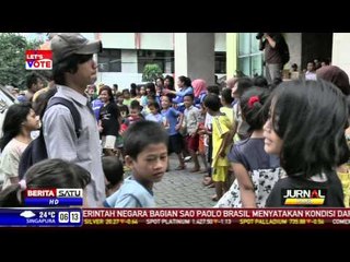 Relawan Hibur Anak-Anak Korban Banjir di Jakarta Timur